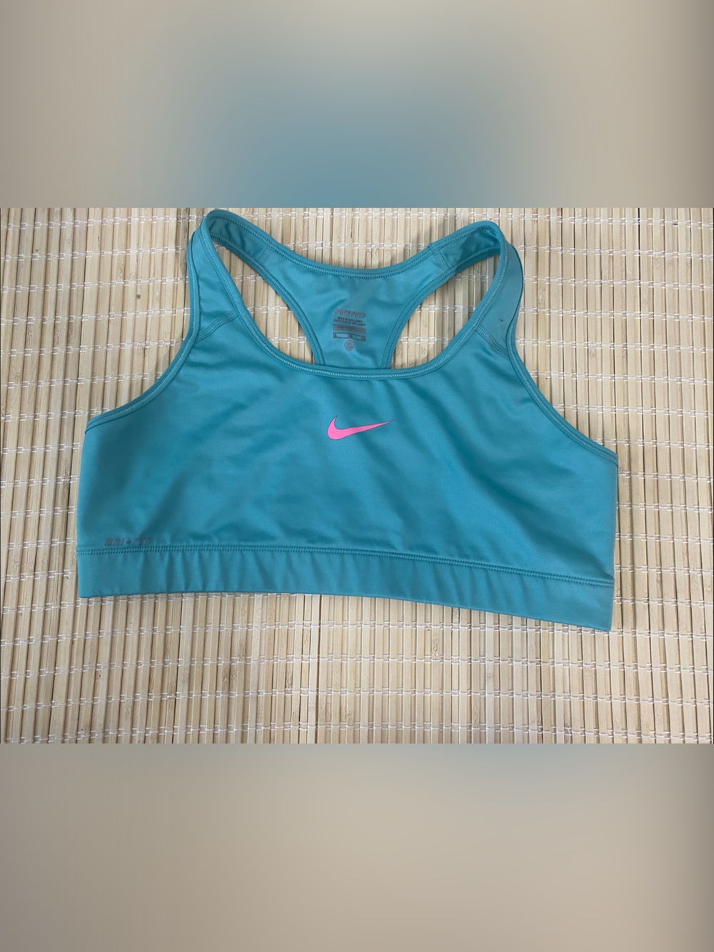 Nike Teal Sports Bra with Pink Swoosh Logo